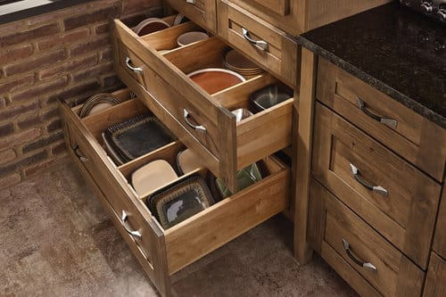kitchen cabinets with open drawers